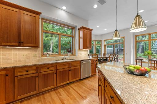 Extensive Granite countertops and center island.