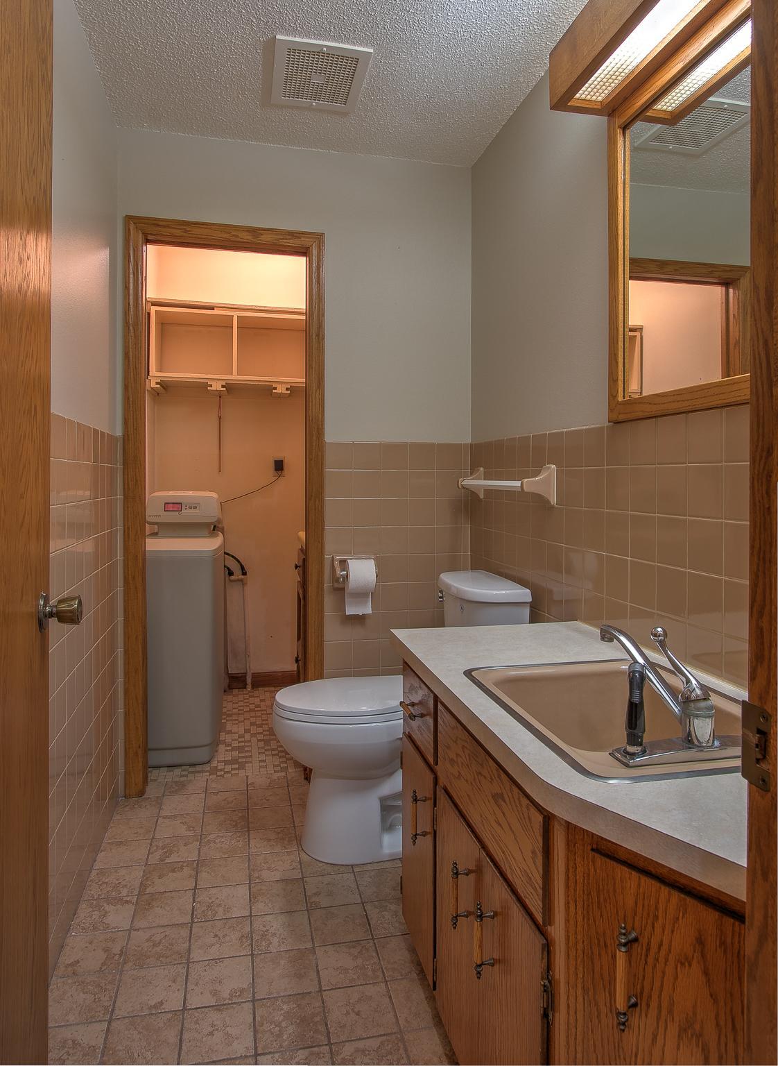 Main floor half bathroom just off the garage