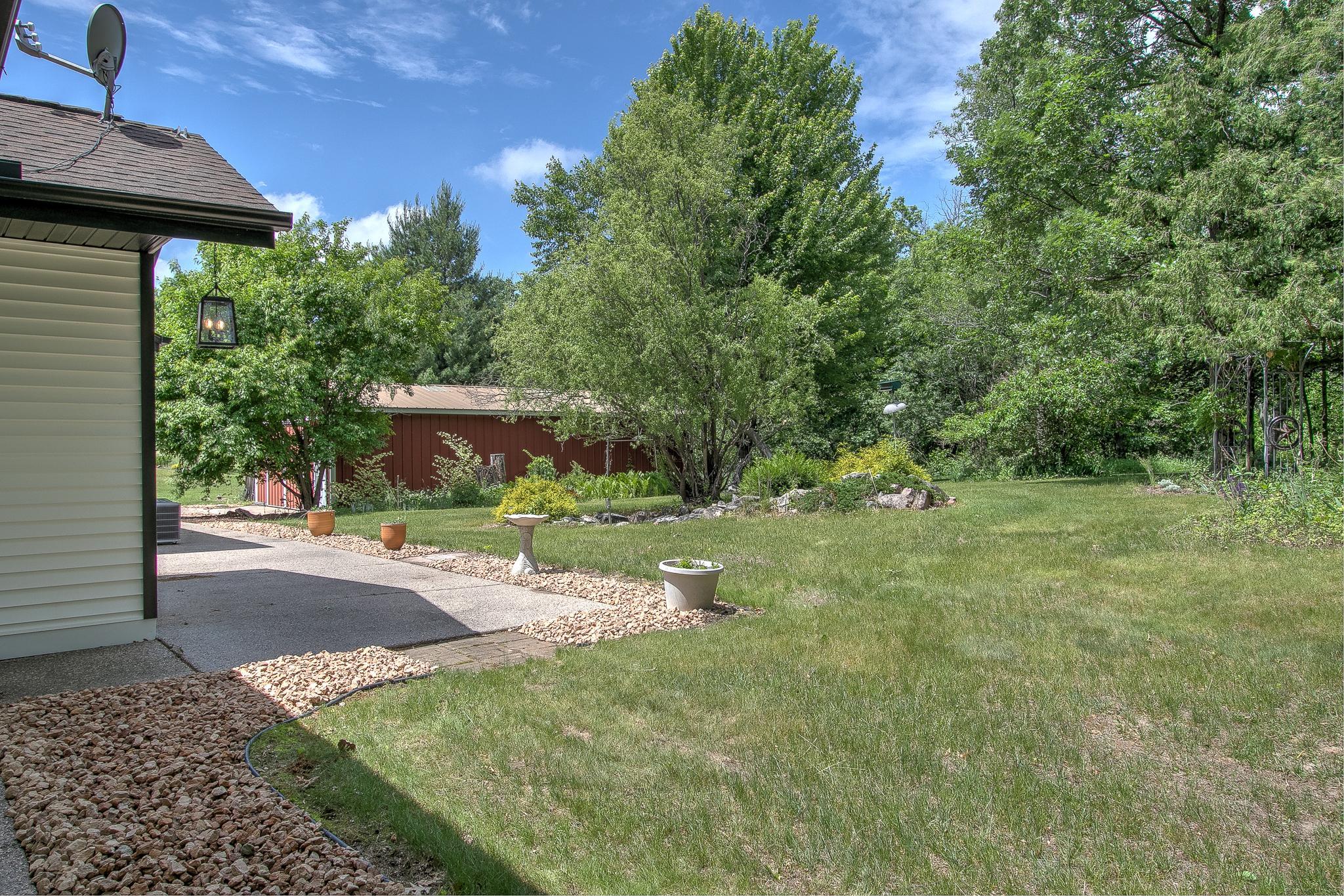 Beautiful gardens surround this amazing home