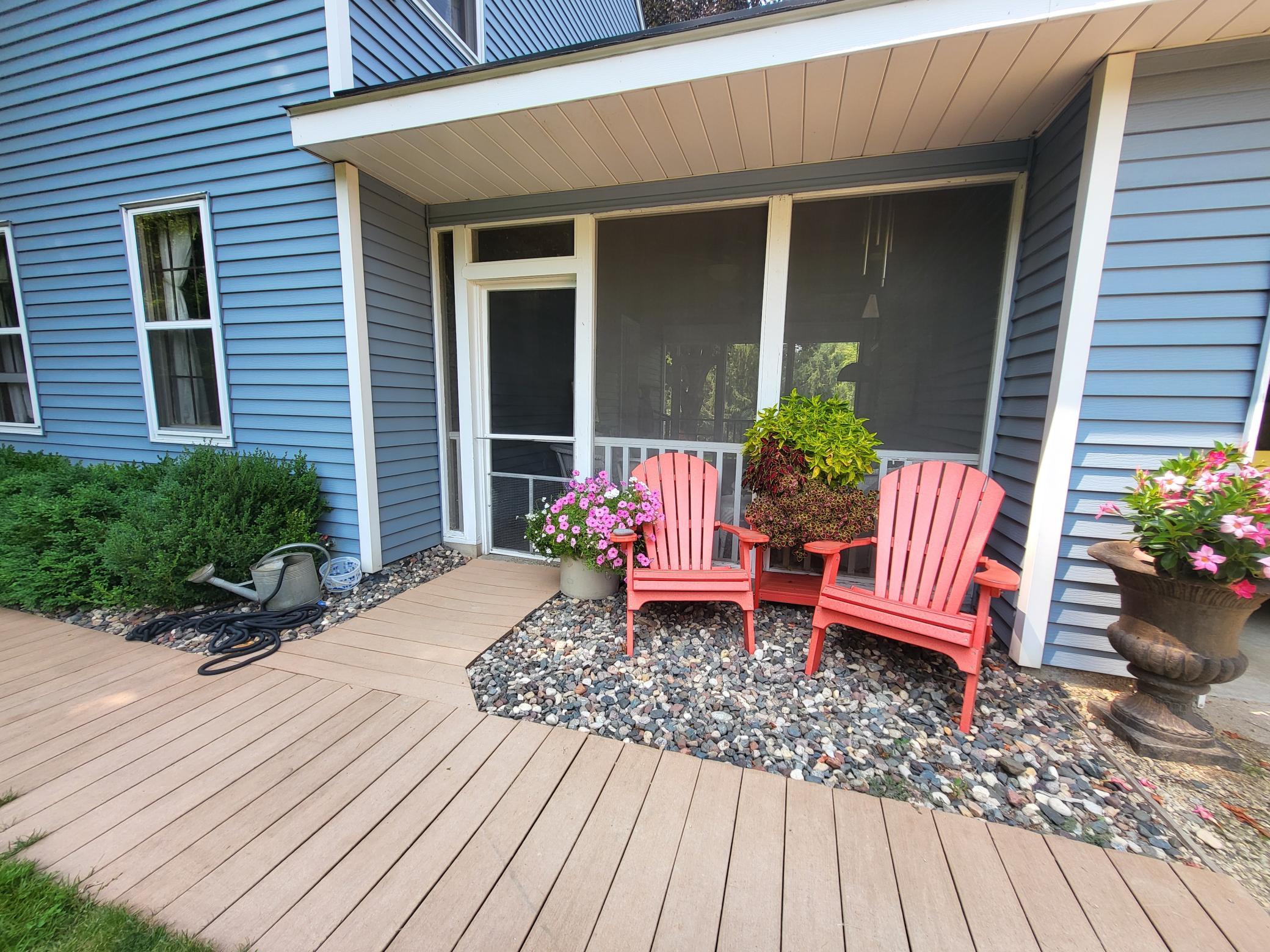 Walkway to the front door and screen porch.