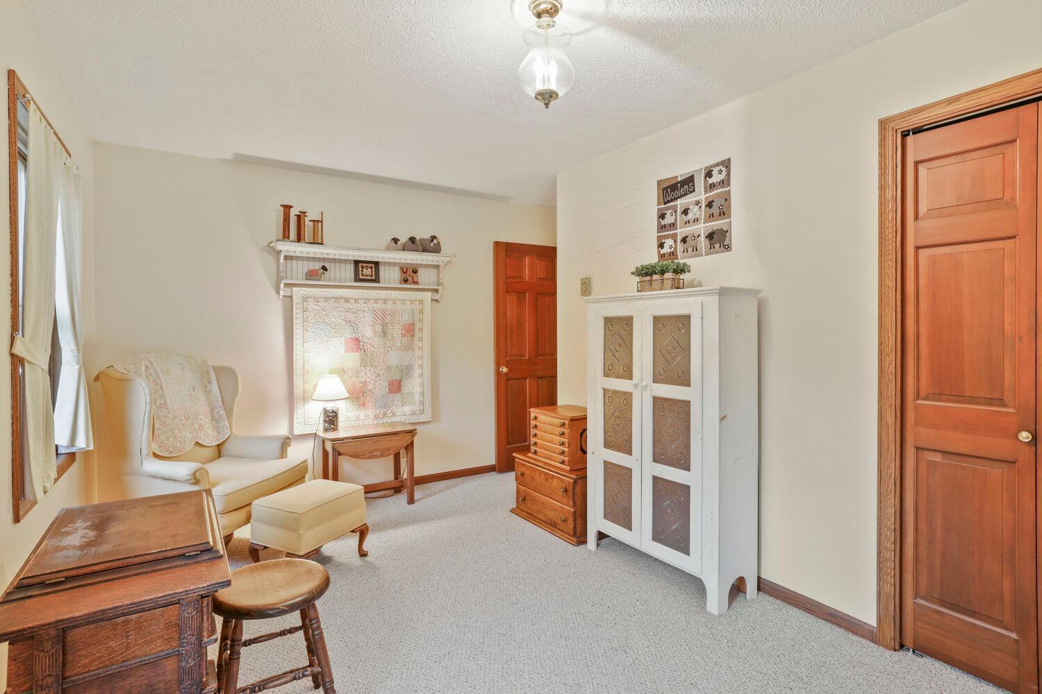A 3rd bedroom with fresh carpet.