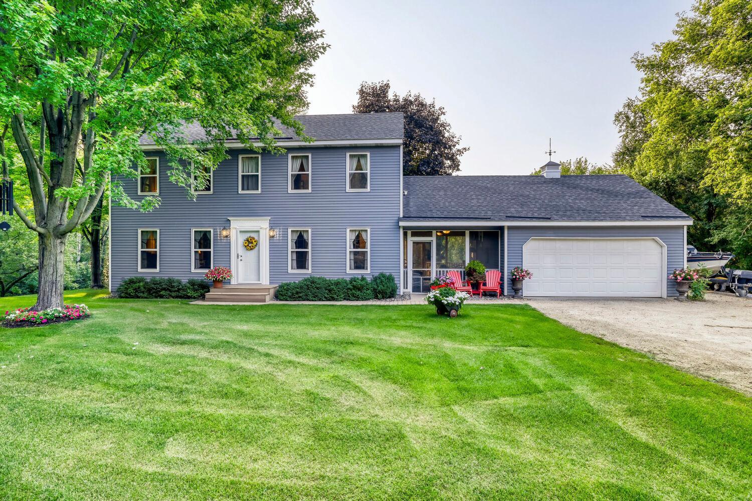 Country Style home on 5 rolling acres of beautiful woods.