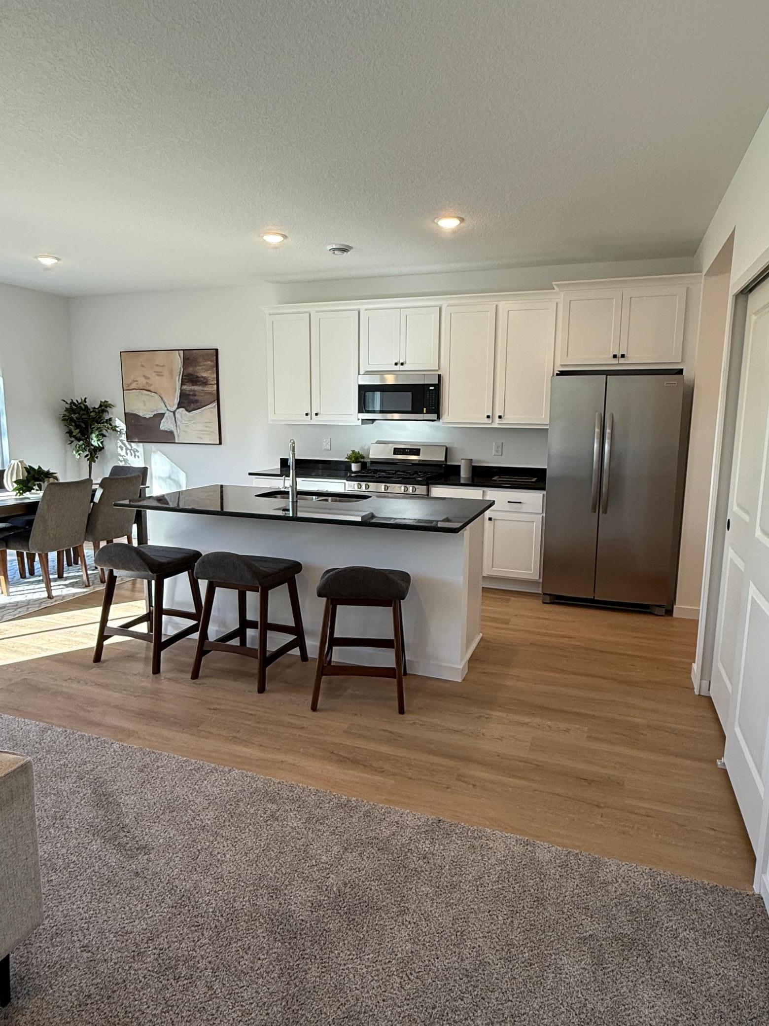 Kitchen with stainless steel appliances and granite countertops
