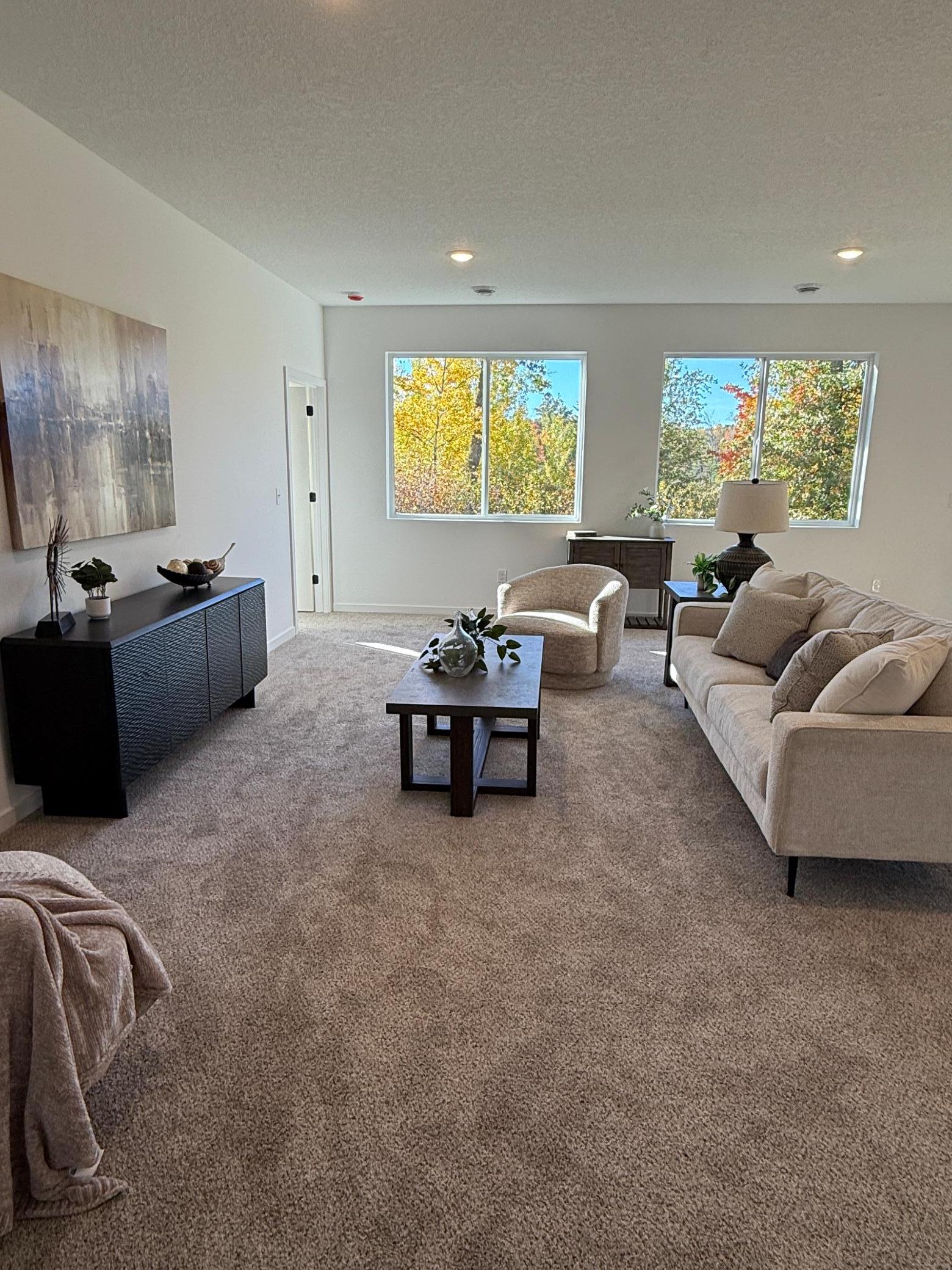 Open floor plan with lots of natural lighting