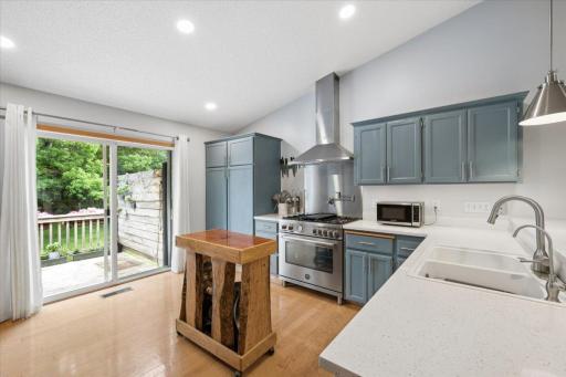 The completely updated kitchen also includes quartz countertops and hardwood flooring.