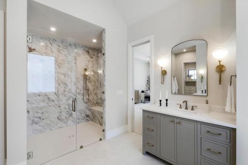 Large walk in shower with showstopper tile