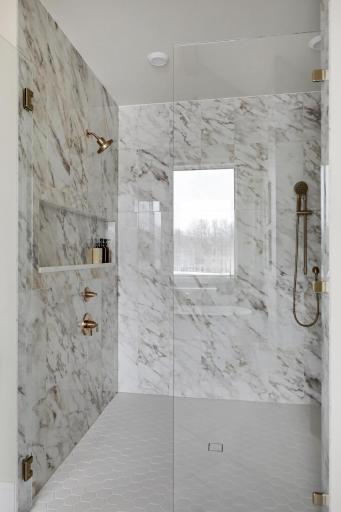 Complete with 2 shower heads and bench
