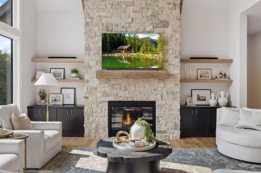 Floor to ceiling stone gas fireplace
