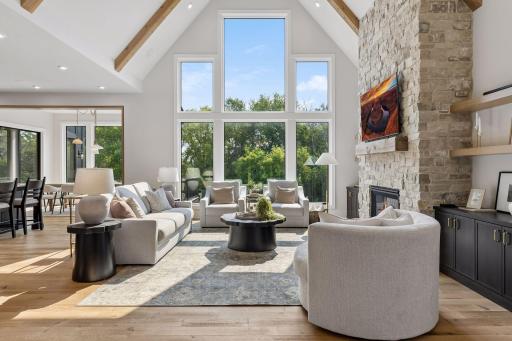 Foyer opens into spacious living room, kitchen & dining