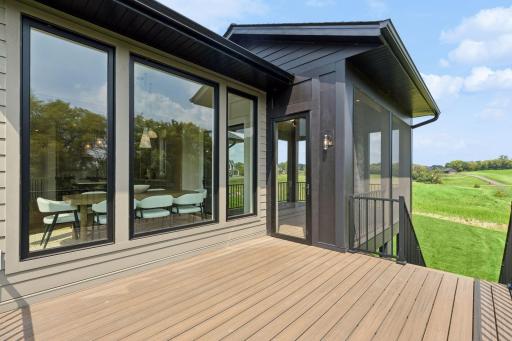 Screened porch leads to open deck