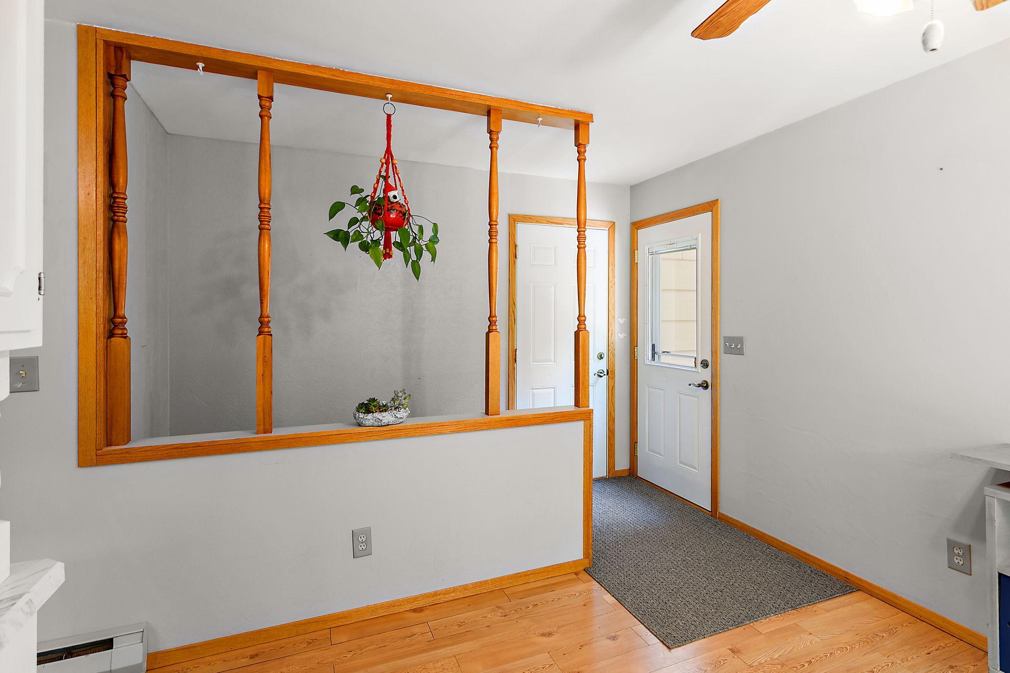 Door to garage and side patio area