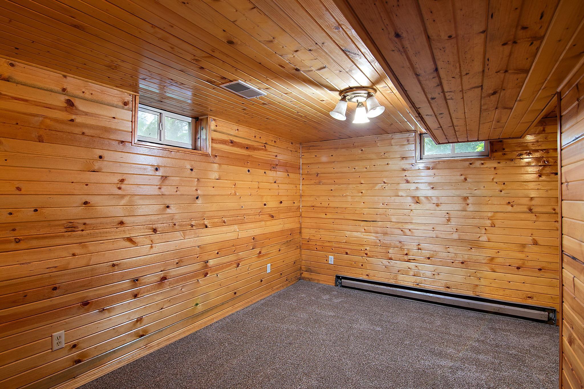 Lower level 3rd bedroom (non-conforming, needs full egress)