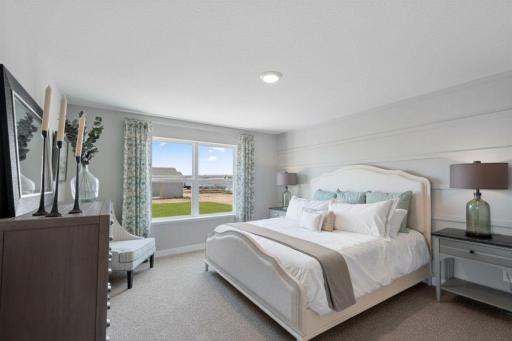 Owner's suite is large enough for a King bed and more. Photo is of actual home. Colors and options may vary. Ask Sales Agent for details.