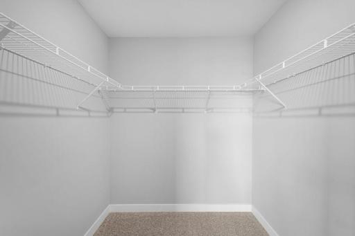 And then there's this: Your own walk-in closet, which is extra deep and connected to the primary bedroom directly in the bedroom. Photo of actual home. Colors and options may vary. Ask Sales Agent for details.