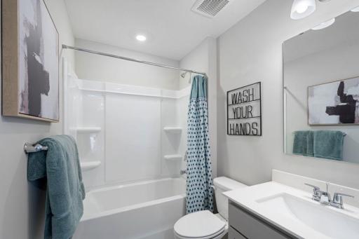 The Bryant II offers a full bath on both upper and lower levels. Photo is of actual home. Colors and options may vary. Ask Sales Agent for details.