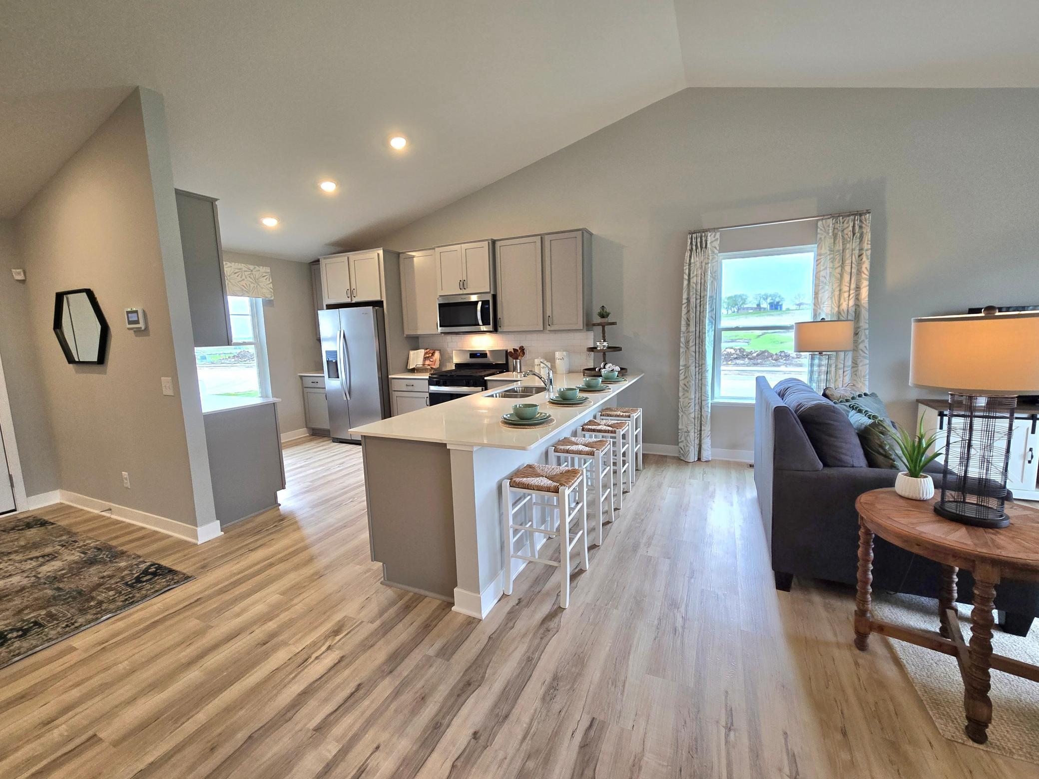 The Bryant II kitchen at Highlands at Eagle View in Elko New Market. Photo is of actual home. Options and colors may vary. Ask Sales Agent for details.