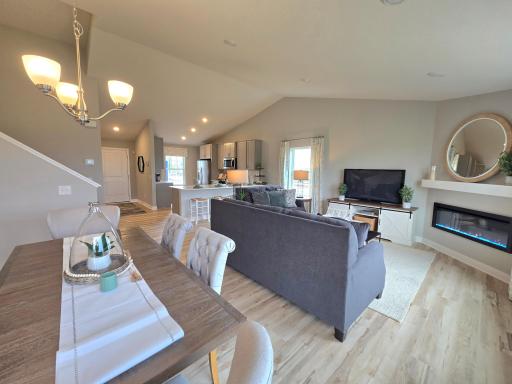 Another highlight to the home, the dining space is close to 15-feet deep and coated in the same hard surface flooring that covers most of the main level. Photo is of actual home. Options and colors may vary. Ask Sales Agent for details.