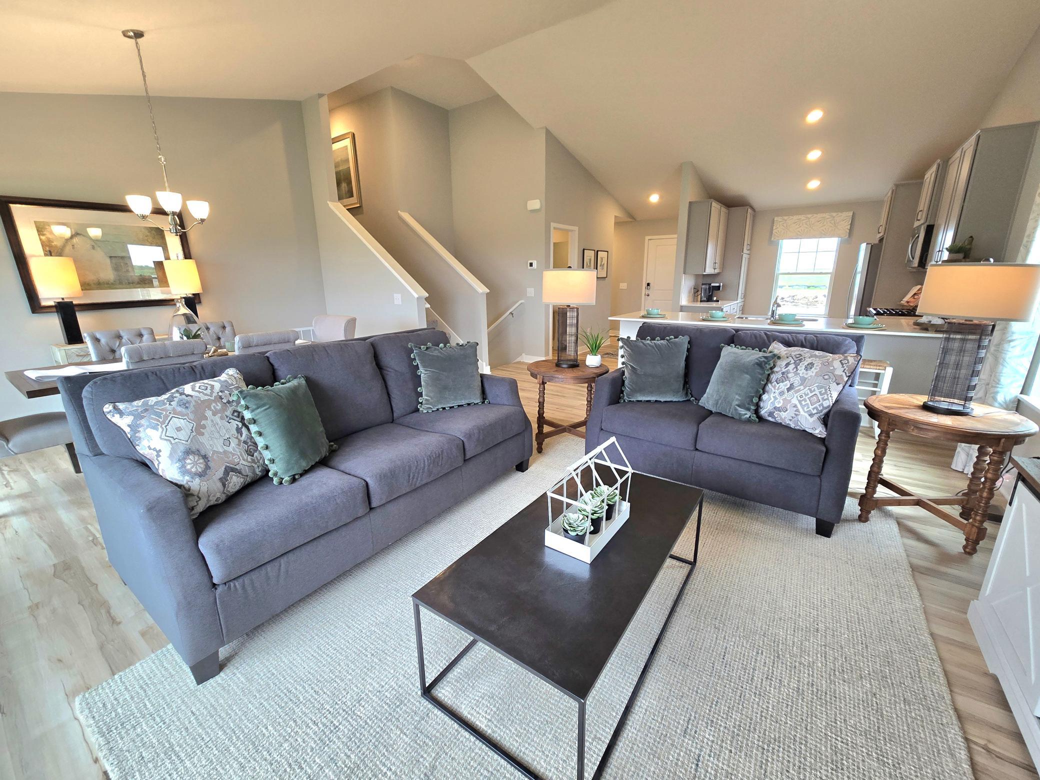 The Bryant II Main Floor at Highlands at Eagle View in Elko New Market. Photo is of actual home. Options and colors may vary. Ask Sales Agent for details.