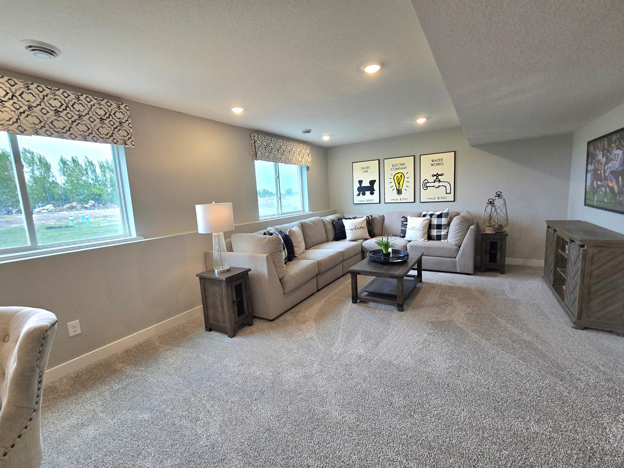 All of that living space up-plus this INCLUDED FINISHED lower level which features an over-sized bedroom with a walk-in closet, another full bathroom plus a giant family room! Photo of actual home, colors and options will vary.