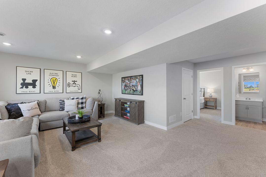 All of that living space up-plus this INCLUDED FINISHED lower level which features an over-sized bedroom with a walk-in closet, another full bathroom plus a giant family room! Photo is of actual home. Colors and options may vary. Ask Sales Agent.
