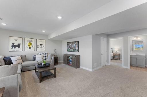 All of that living space up-plus this INCLUDED FINISHED lower level which features an over-sized bedroom with a walk-in closet, another full bathroom plus a giant family room! Photo is of actual home. Colors and options may vary. Ask Sales Agent.