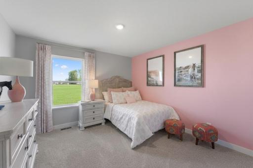 Bedroom #3 with lots of natural light! Photo of actual home. Options and colors may vary. Ask Sales Agent for details.