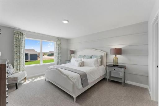 Another view of the Owner's suite. Photo is of actual home. Colors and options may vary. Ask Sales Agent for details.