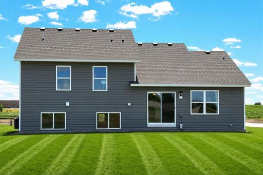 The Bryant II rear view with Lookout at Highlands at Eagle View in Elko New Market. Photo is of a actual home. Options and colors may vary. Ask Sales Agent for details.
