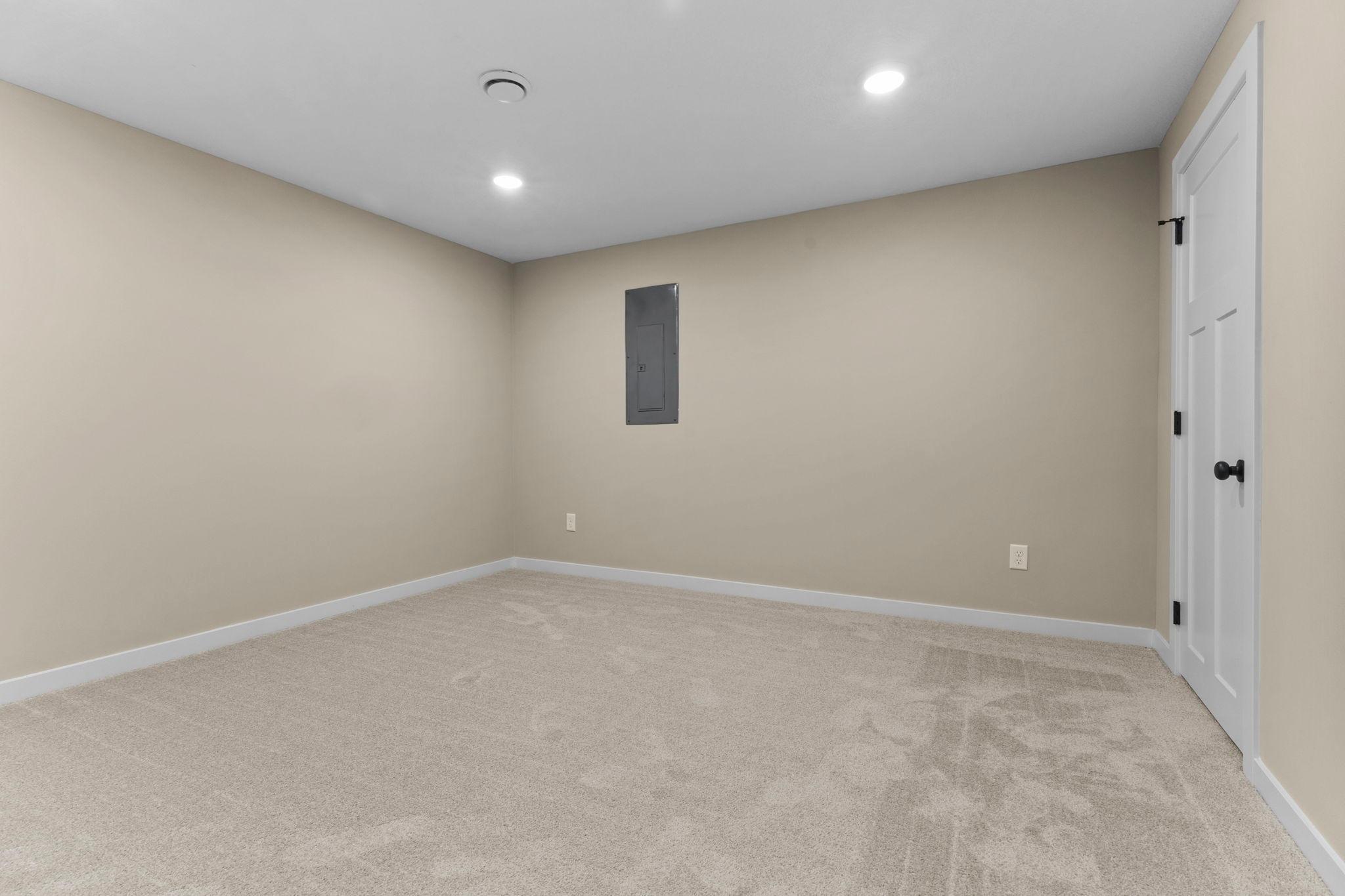 The finished fourth level expands the home’s living space with a generous family room offering flexibility, comfort, and room to relax or entertain.