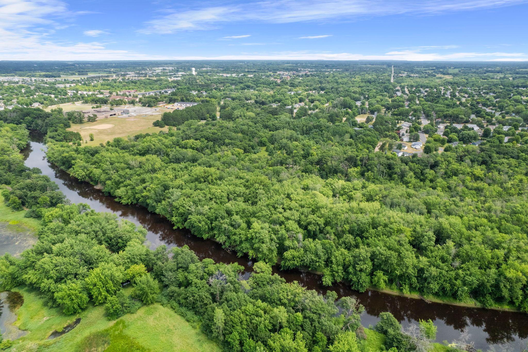 Outdoor adventures and daily conveniences are nearby with the Rum River, trails, and shopping just minutes away, making this location both relaxing and practical.
