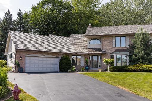 Don't drive by when you can set up a time to tour this fantastic home.
