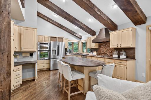 Beamed ceiling accents this center island kitchen.