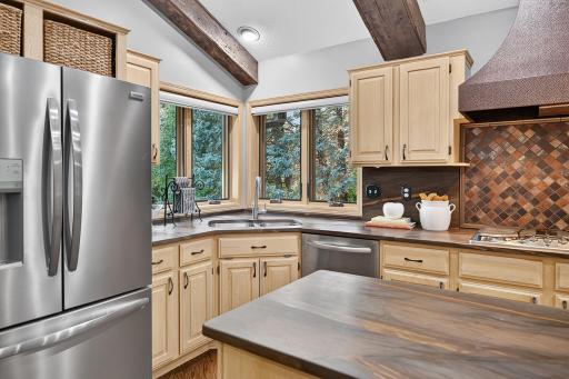 Flow of the kitchen works well for daily tasks and large groups of guests.