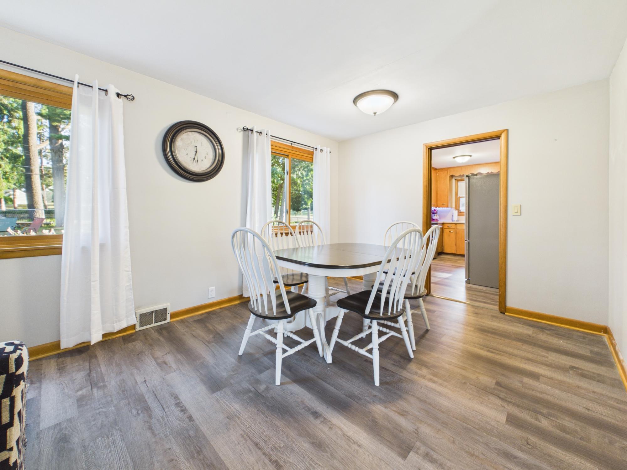 Dining area conveniently positioned between the kitchen and living room for an easy everyday layout.