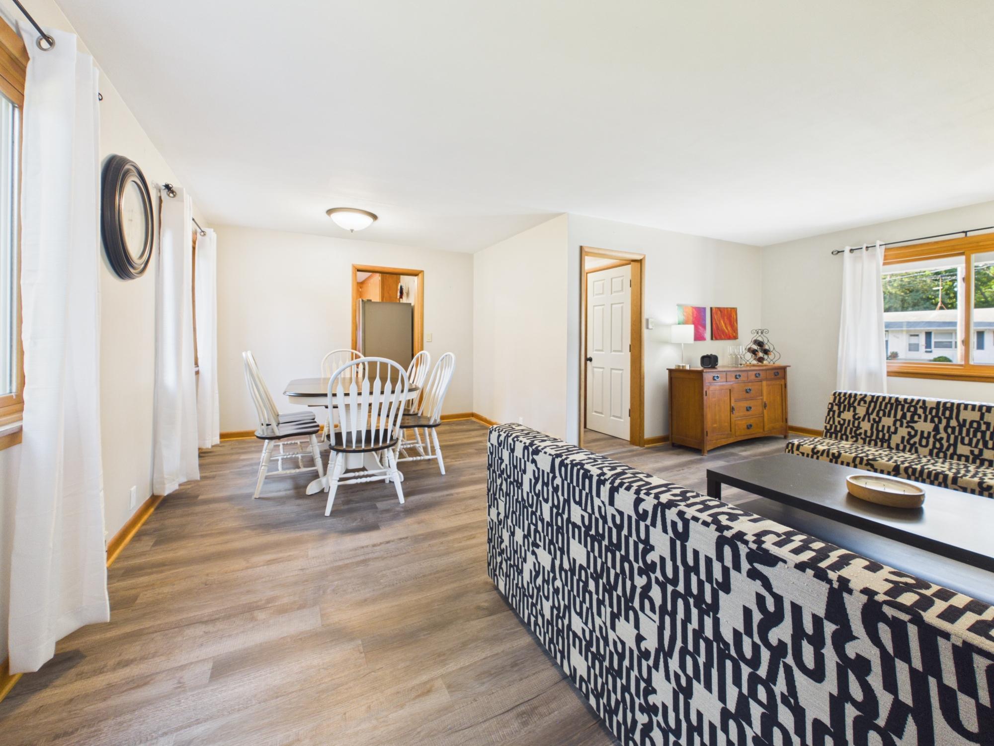 Main living and dining areas connect naturally while still providing distinct spaces for relaxing and gathering.