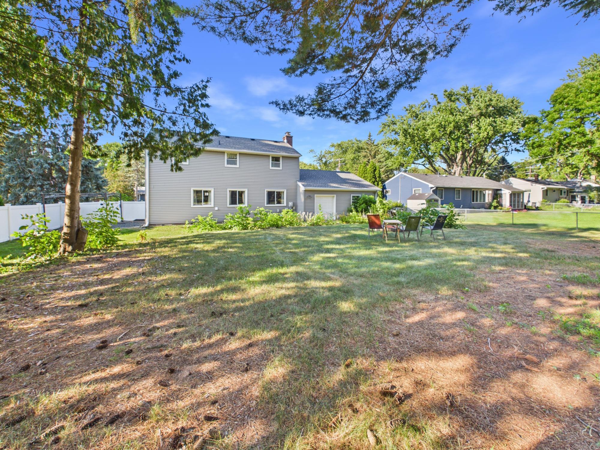 Looking back toward the home from the yard gives another perspective on just how large this backyard really is.