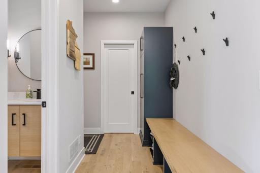 Mud room from the garage with storage space