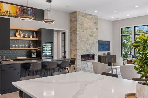 Stylish wet bar right off the kitchen and living room