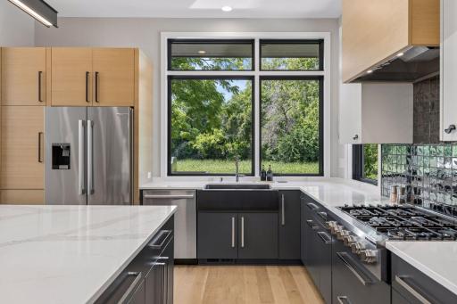 Oversized kitchen window to enjoy the private view