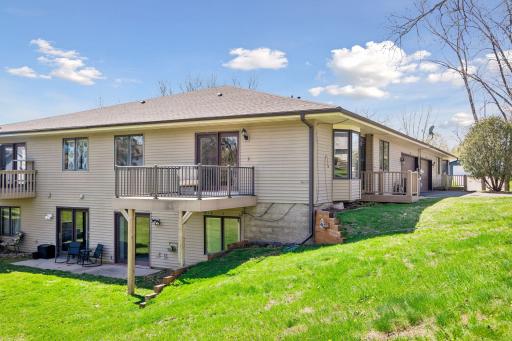 Rear view shows deck and patio
