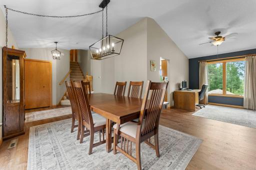 Vaulted ceilings in large dining room with flex room