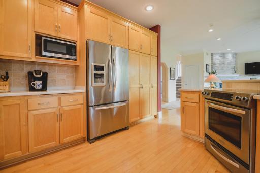 Abundant cabinetry and storage space throughout the kitchen