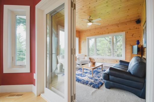 Four season pine porch overlooking the private park like property