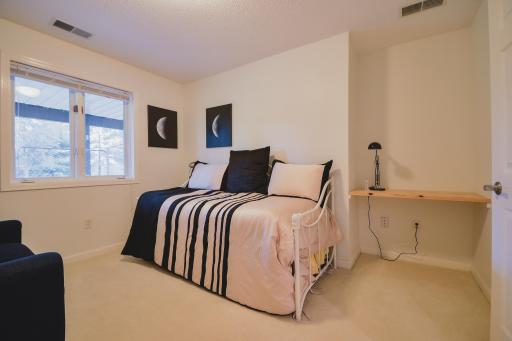 Includes a desk nook area and a view of the backyard area