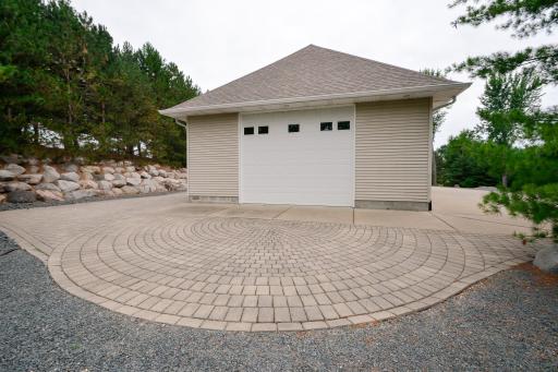 40x80 outbuilding with six overhead doors, 14 ft ceiling, 12 ft access doors, full frost footings