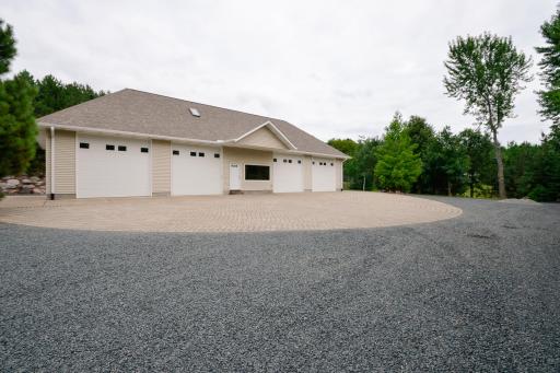 Pine finished interior ideal for business, storage, recreation. Additional upper loft.