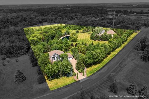 9.11 acre home conveniently located near schools, parks & local amenities!