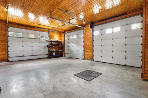 Outbuilding has separate well, holding tank, bathroom, hot/cold water, and 200-amp service