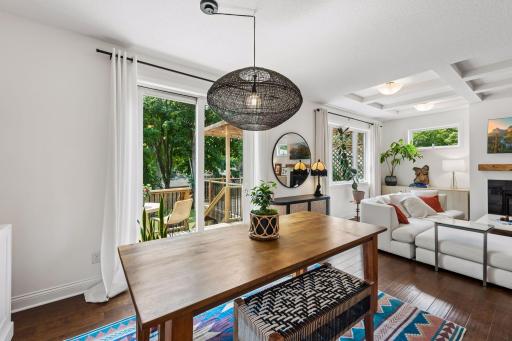Host memorable gatherings with dining just steps from the deck and pergola. Large sliding doors invite sunshine inside while providing beautiful views of the private backyard.