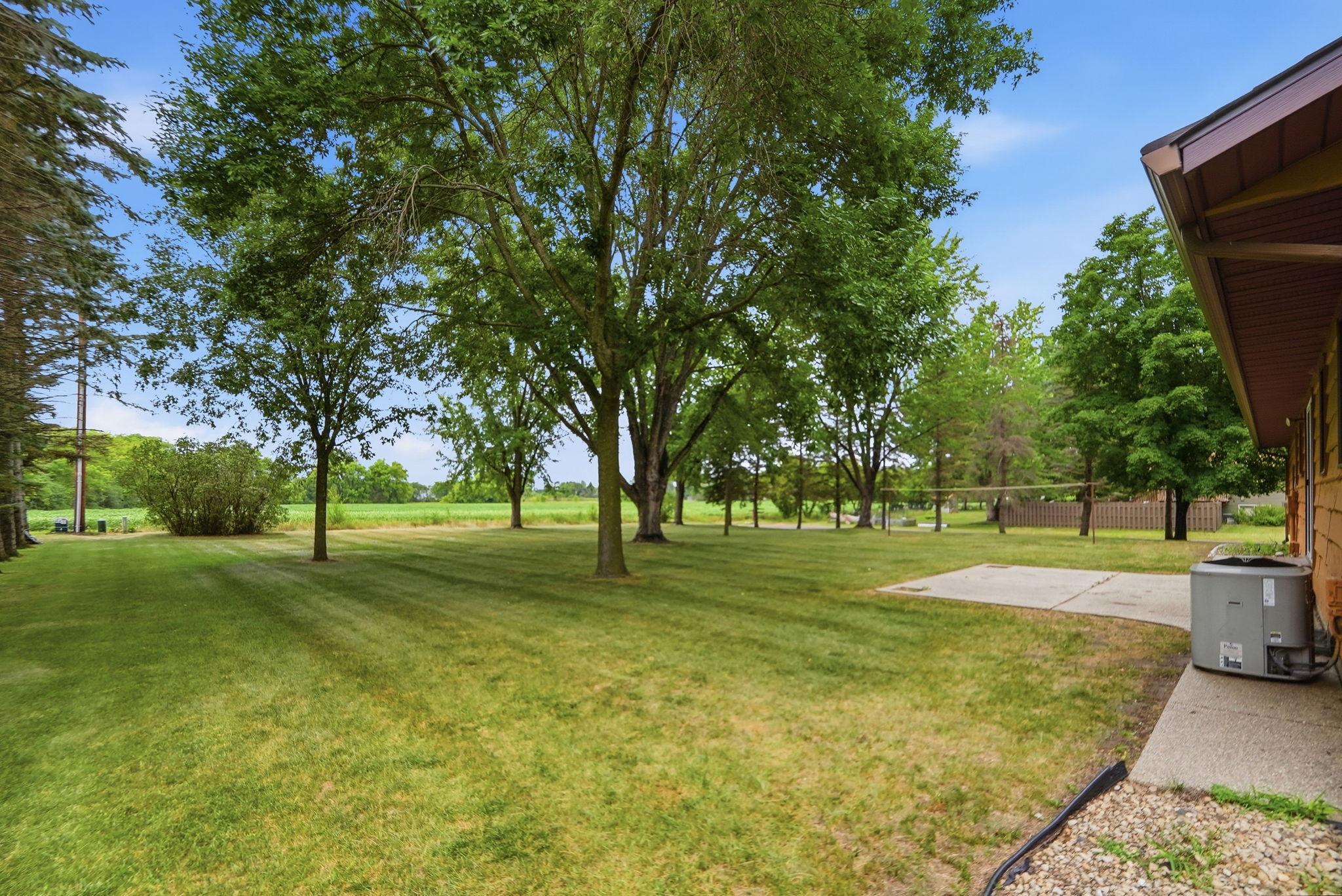 The back of the home faces fields, so no backyard neighbors!